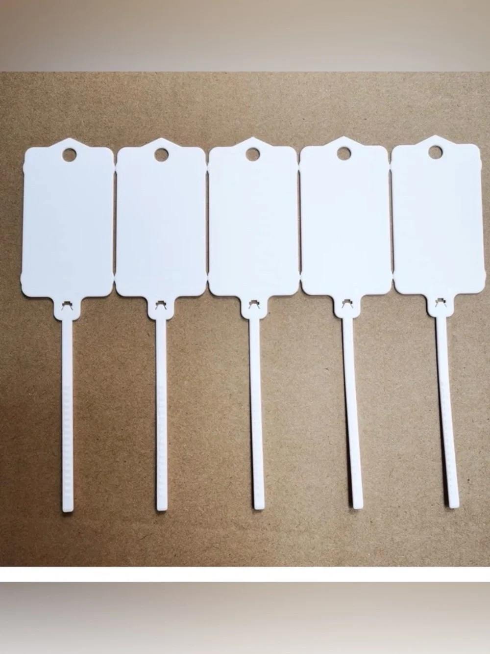 100-White Reusable waterproof clothing tags